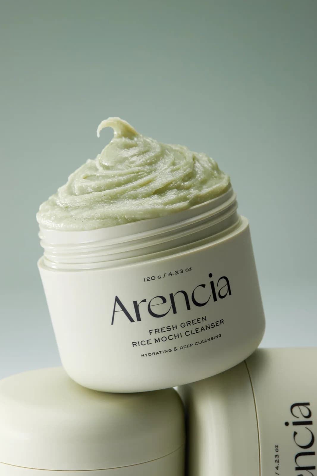Limpiador Facial Green Rice Mochi Cleanser — Limpiador facial de textura tipo mochi, con arroz verde, que limpia profundamente y purifica poros sin sensación de resequedad.